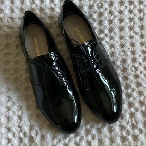 Prada woman’s  Glossy Black Oxfords NWOT